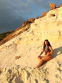 On sunset on pink sand
