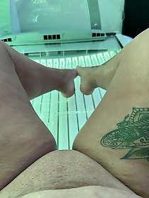 A very sexy woman is naked in these photographs.