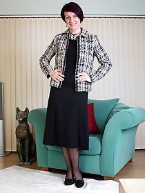 Naughty housewife stripping and teasing