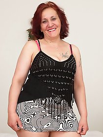 Horny mature lady getting ready to please herself