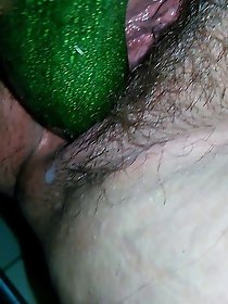 Smiling female puts on hot bra