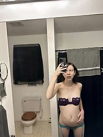 Older strumpet is fingering herself