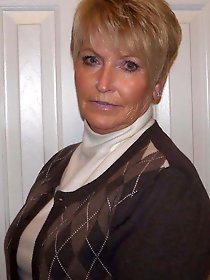 Curvy older strumpet is showing her sexy lines on camera