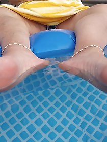 Relaxed feet in the water